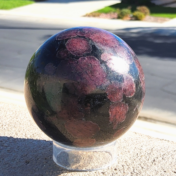 Vibrant Garnet & Astrophyllite Sphere - Picture 3 of 16